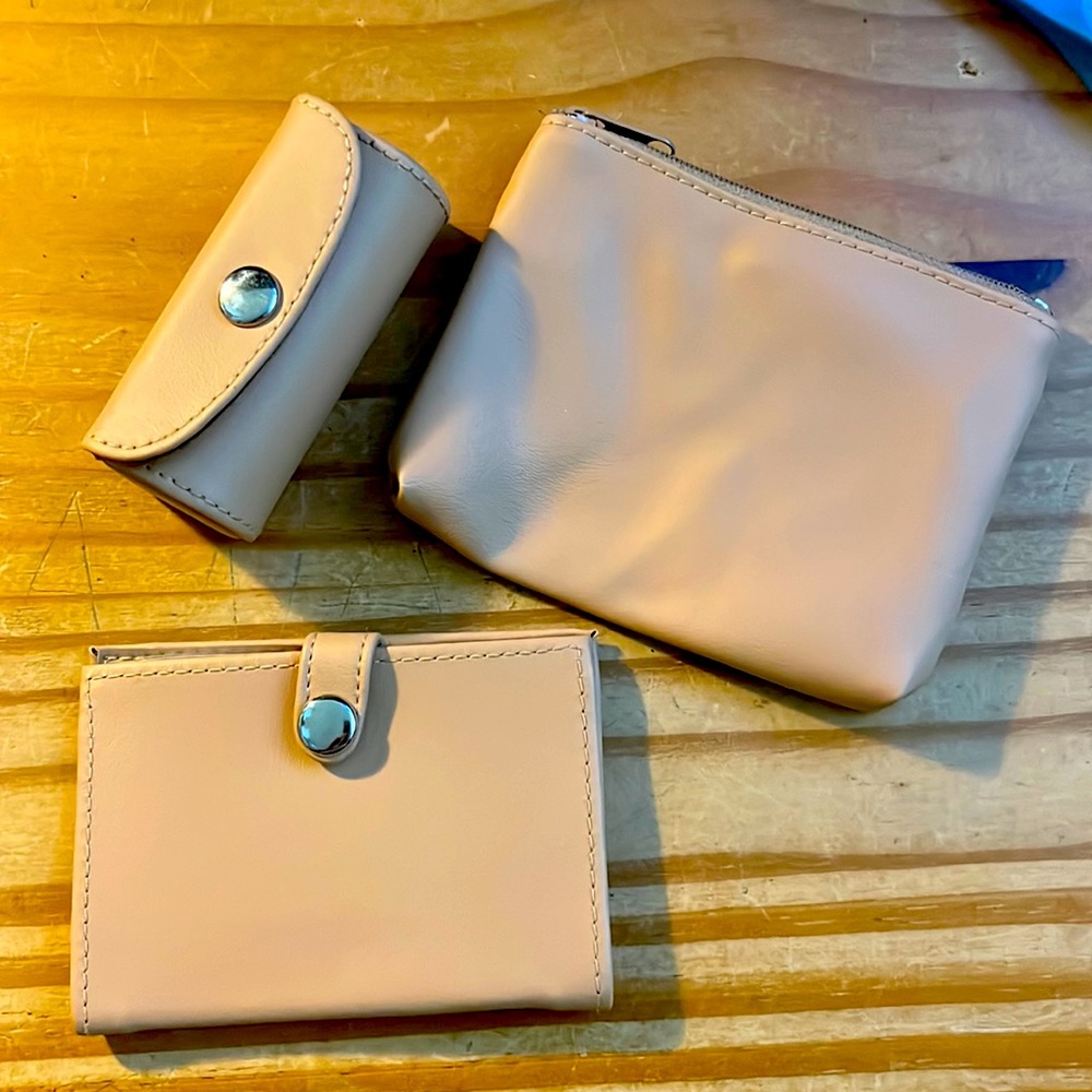 Trio of cases, lipstick, coin and cards